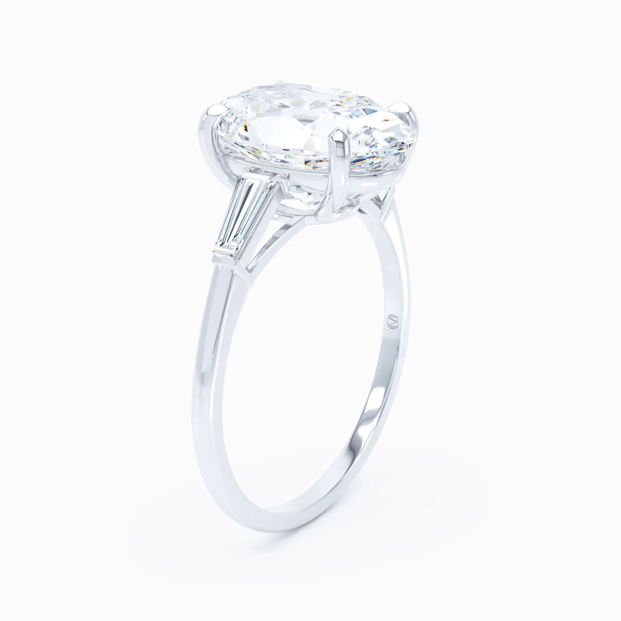 3 Stone - Baguette Sides - Oval Engagement Ring