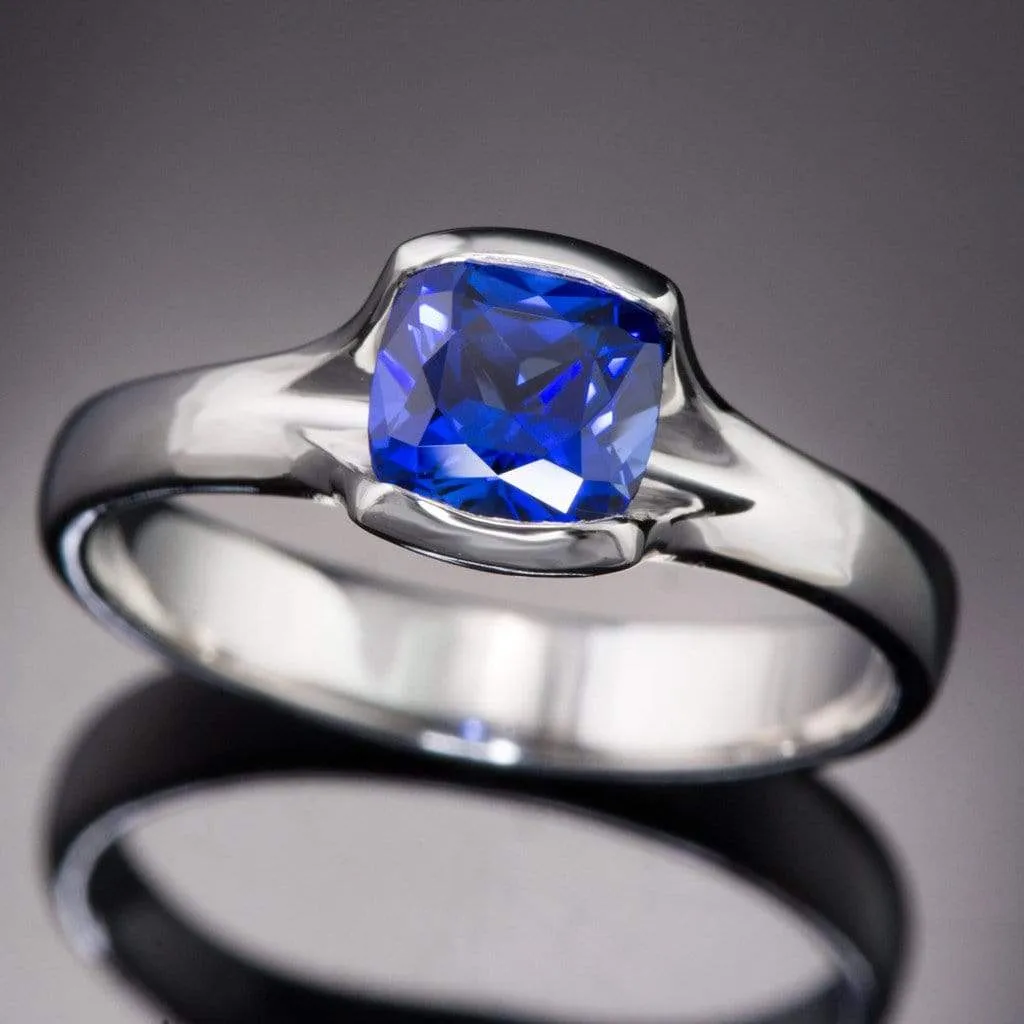 Cushion Cut Blue Sapphire Fold Solitaire Engagement Ring