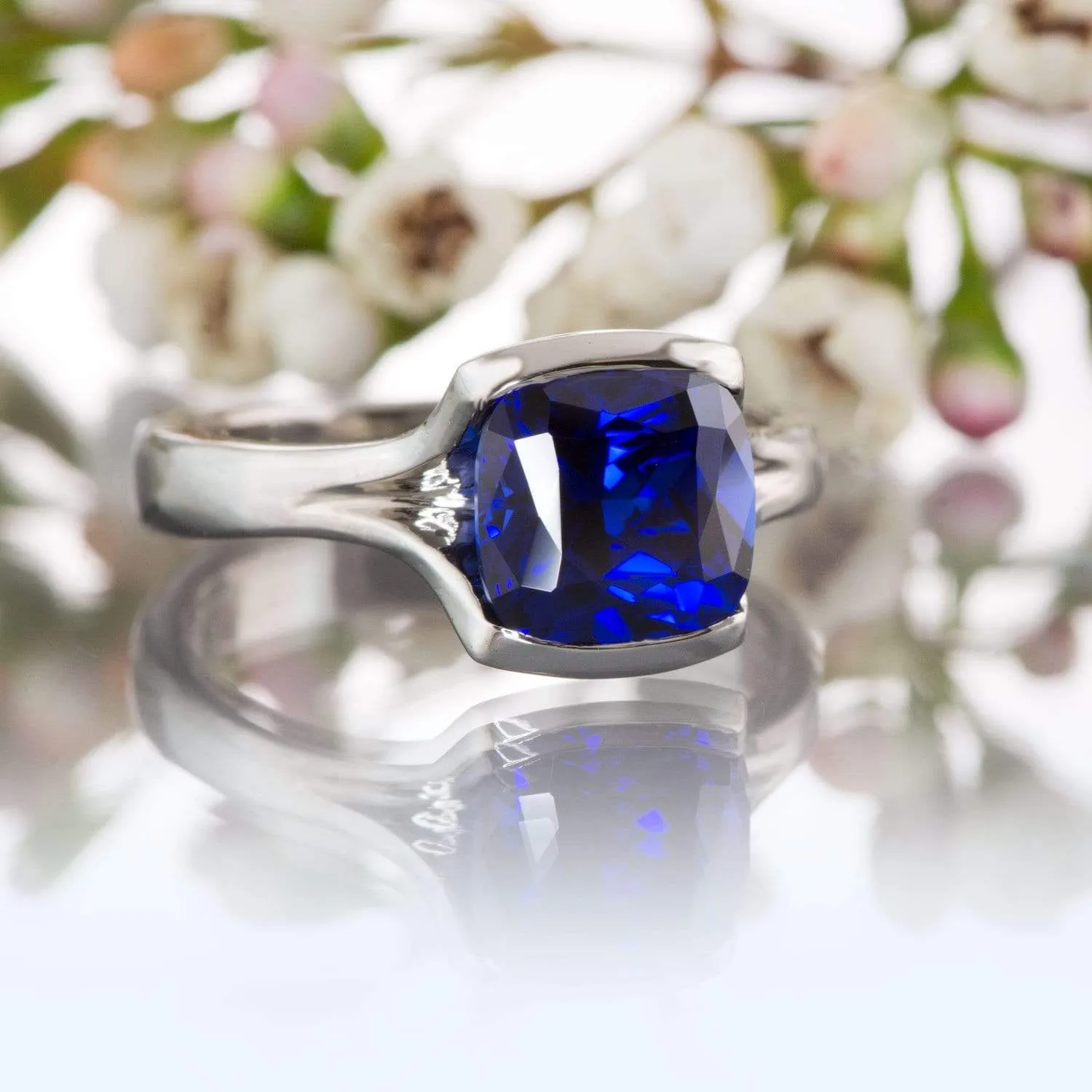 Cushion Cut Blue Sapphire Fold Solitaire Engagement Ring