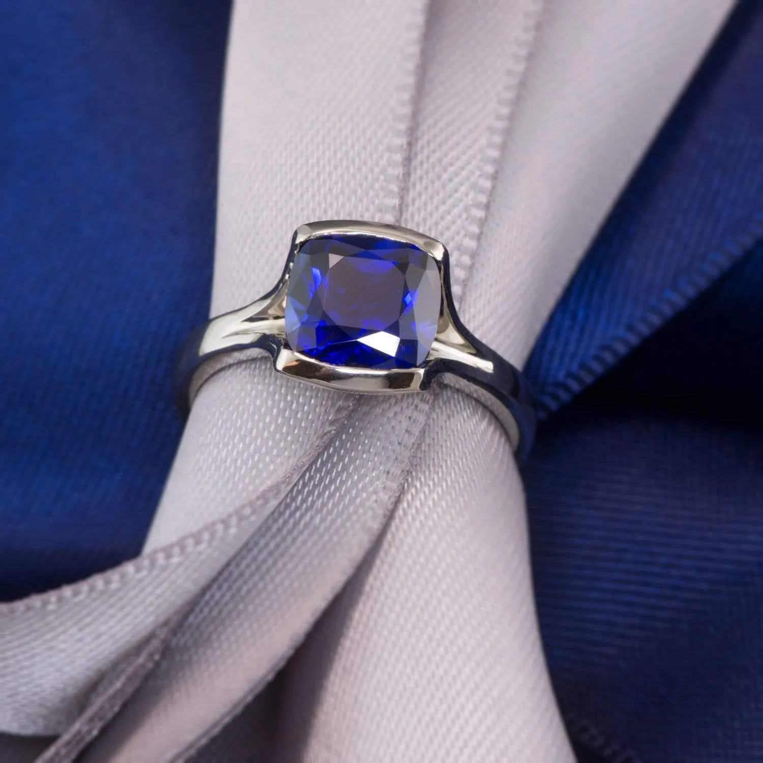 Cushion Cut Blue Sapphire Fold Solitaire Engagement Ring